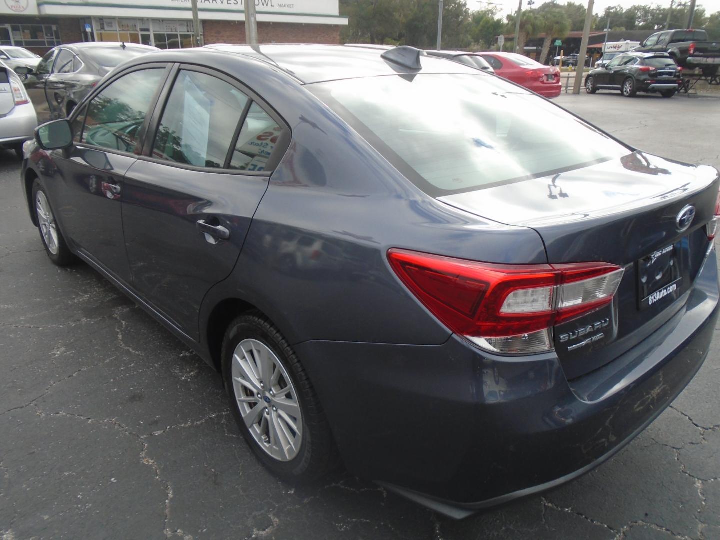 2017 Subaru Impreza 2.0i Premium CVT 4-Door (4S3GKAB65H3) with an 2.0L H4 DOHC 16V engine, CVT transmission, located at 6112 N Florida Avenue, Tampa, FL, 33604, (888) 521-5131, 27.954929, -82.459534 - Photo#4